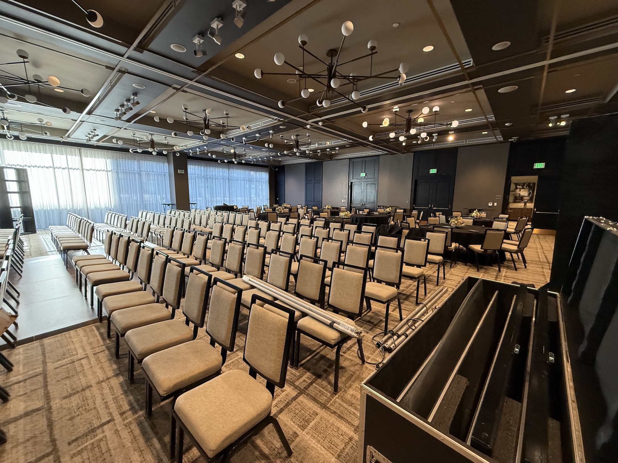 Basketball Themed Bar Mitzvah Venue Empty event hall with chairs arranged in rows and tables in the background, ready for a gathering.